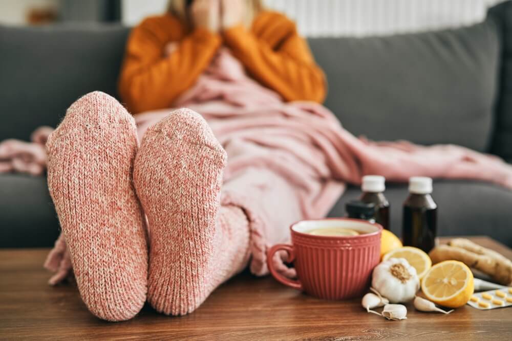 Woman,With,Warm,Socks,Having,A,Heavy,Flu